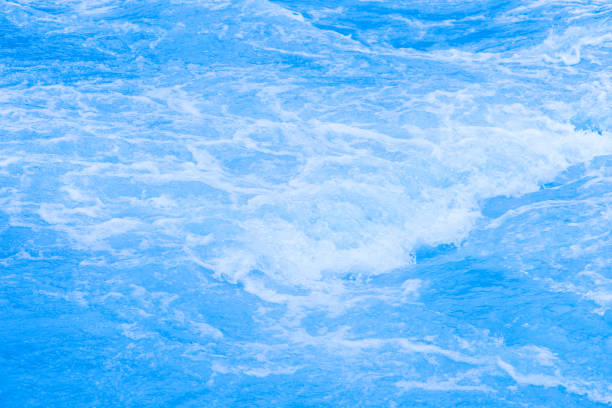Blue water in the sea as an abstract background. Texture.