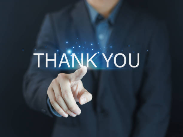 istock Businessman using laptop and displaying thank you message on screen. Congratulations and presentation from digital technology. Thank you business 2169385592