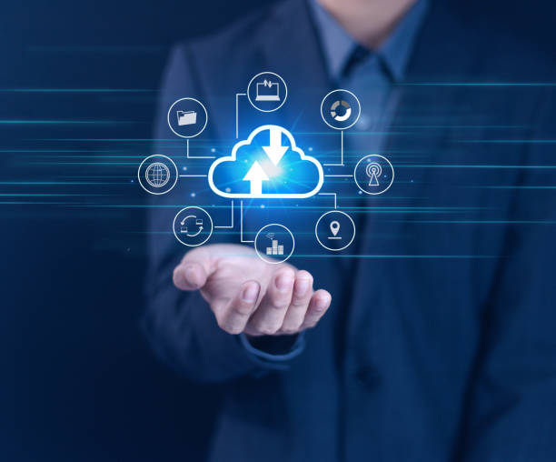 istock Businessman cloud service for storage and transfer of files, global data processing concept, backup and technology icons 2169385638