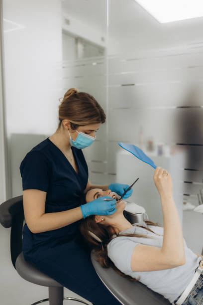 istock portrait of a female dentist at work 2169389132