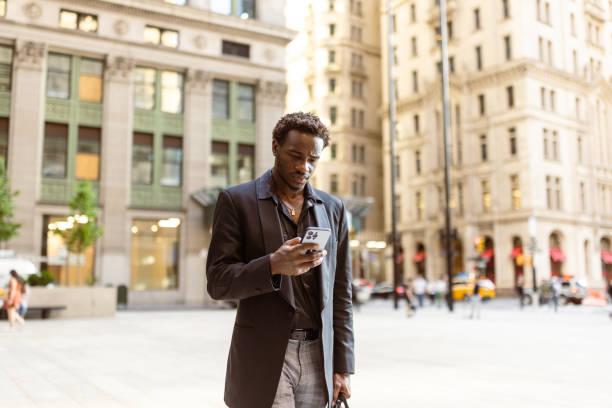 istock Urban Professional Reading Smartphone 2169393998
