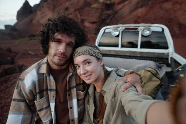istock Travelers taking selfie on smartphone 2169394711