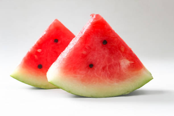pieces of watermelon on a white background