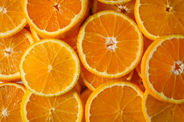 istock Orange chopped against orange background. 2169403046