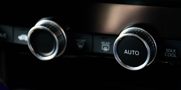 istock Button automatically adjust the air conditioning temperature in a modern car luxury interior 2024. Function control panel buttons in modern car. 2169406892