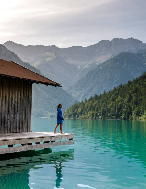 istock A tranquil moment by the emerald waters of Plansee, Austria with stunning mountain backdrop 2169409962