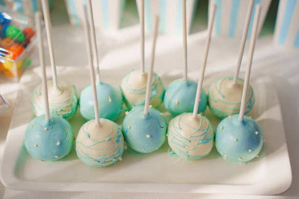 istock White and blue cakepops for a children's party. 2169413488