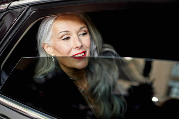 istock Glamorous celebrity arriving at event by car 2169416290