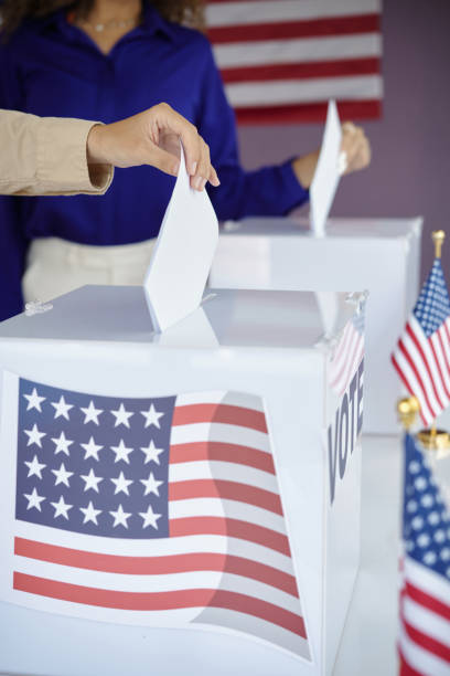 istock People Putting Bulletins In Boxes 2169417622