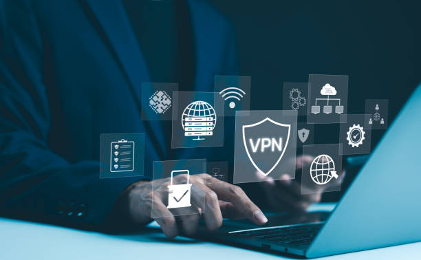 istock VPN, Virtual Private Network encryption connection concept. Businessman working on laptop, surrounded by digital security icons VPN shield, server, padlock, online security, and data protection. 2169418565