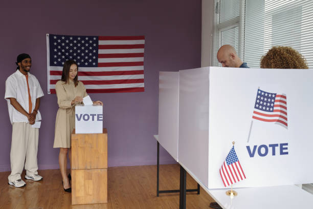 istock People Voting For Candidates During Election Day 2169419282