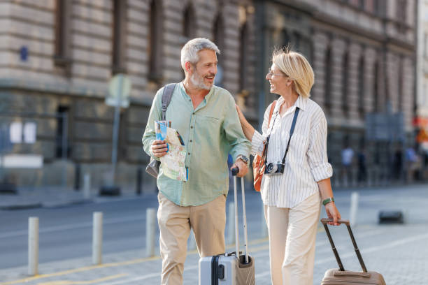 istock Happy mature couple exploring a new city 2169421161