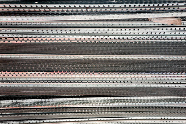Stack of gray stainless steel metal profile close-up