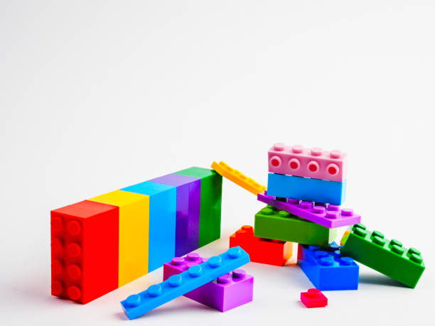 istock Kids' Construction Set: Border of Assorted Blocks Arranged on a White Surface 2169425278