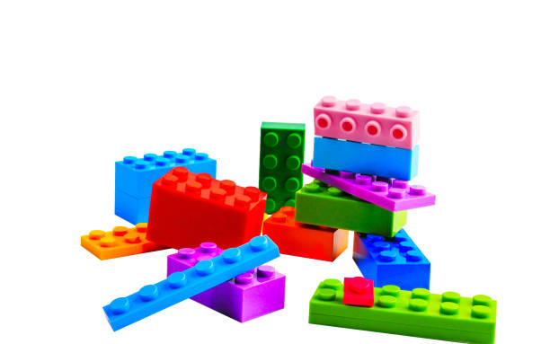 istock Kids' Construction Set: Border of Assorted Blocks Arranged on a White Surface 2169431248