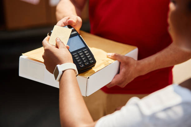 istock Processing Credit Card Payment at Retail Counter 2169432693