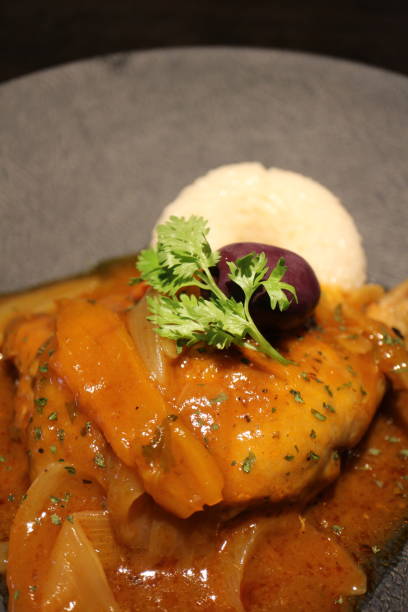 istock Peruvian cuisine: stewed chicken and garlic rice 2169438757