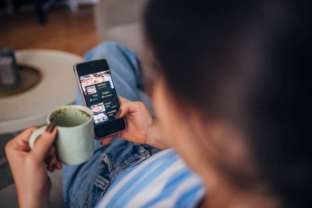 istock Comfortable individual browsing media on smartphone app 2169440059