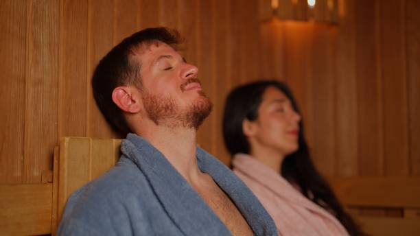 istock Couple relaxing in sauna 2169440616