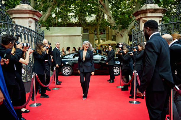 istock Glamorous celebrity arriving at red carpet event 2169441439