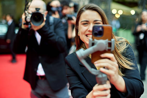 istock Young vlogger filming at celebrity event 2169448346
