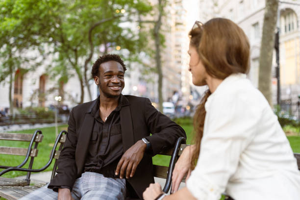istock Friendly Chat in Urban Park 2169448998