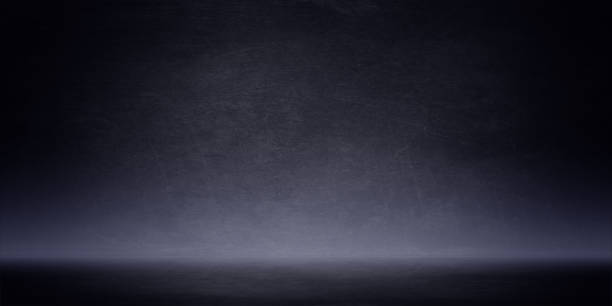 istock Dark and soft blue abstract cement wall and studio room gradient background 2169450652