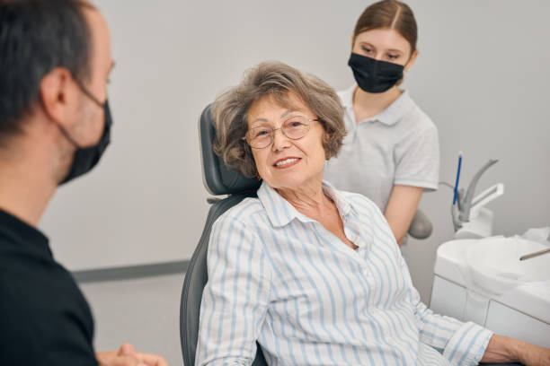 istock Elderly female patient at a doctors appointment communicates with specialist 2169451417
