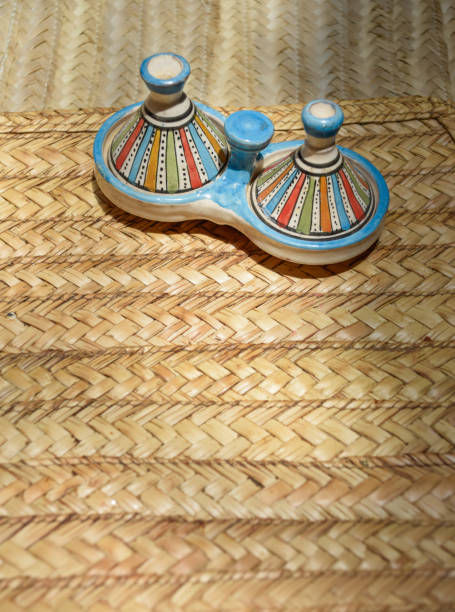 istock Decorative Tajine from Marrakech displayed on a table with an esparto grass rug 2169452181