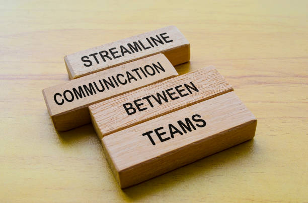 istock Streamline communication between teams text on wooden blocks. Operational Excellence and team work concept 2169455342
