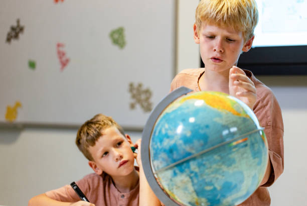 istock Two boys collaboration in private school 2169459314