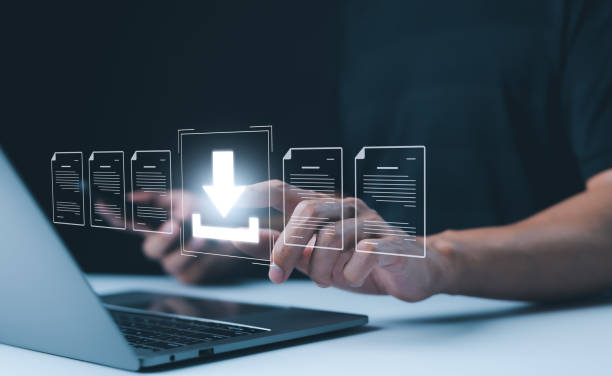 Digital File Download and Data Transfer Technology. Person interacting with digital interface to download files, symbolizes modern data transfer, file management, technology-driven business operations tecnología de descarga de archivos digitales y transferencia de datos. la persona que interactúa con la interfaz digital para descargar archivos, simboliza la transferencia de datos moderna, la gestión de archivos, las operaciones comerciales impulsadas