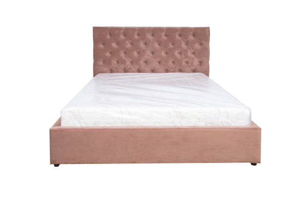 istock Double bed with soft headboard. Cushioned furniture. 2169460268