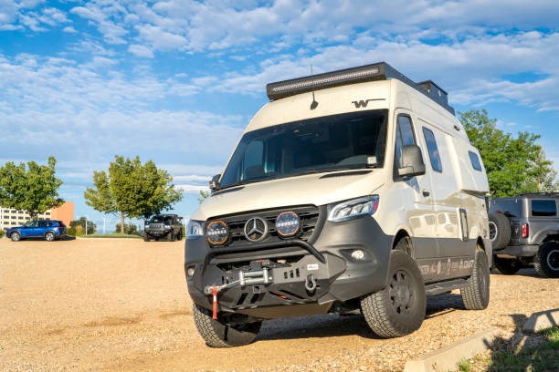 Loveland, CO, USA - August 23, 2024: Winnebago Revel 4x4 camper van with a customized front bumper and winch.