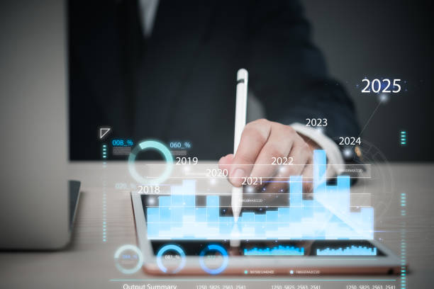 istock business professional analyzing a digital graph with a pen, highlighting data trends and future growth projections in a corporate environment. Finance, business analysis, 2169462087