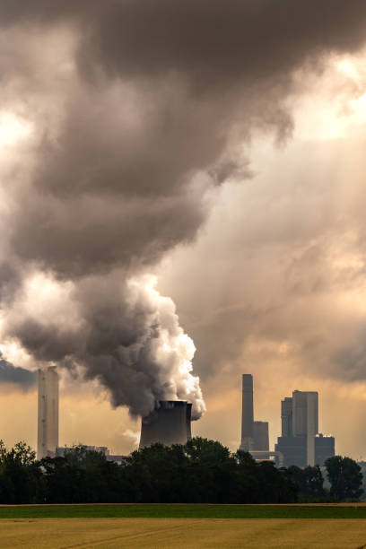 Power plant factory chimney emissions causing air pollution.