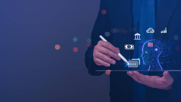 istock A man is holding a tablet and drawing on it. The tablet is displaying an Ai. Concept of creativity and the use of technology AI in future 2169466169