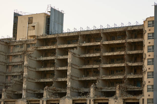 istock Buildings under demolition with exposed rebar 2169468750