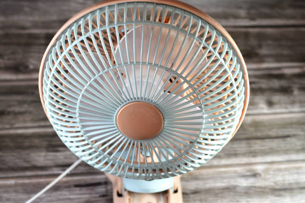 istock Table clip fan, mini small portable electric fan with multiple speed, a machine for producing airflow, often used for cooling 2169468850