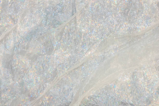 Background of white shiny silk fabric with draperies. For your design for Christmas or wedding.