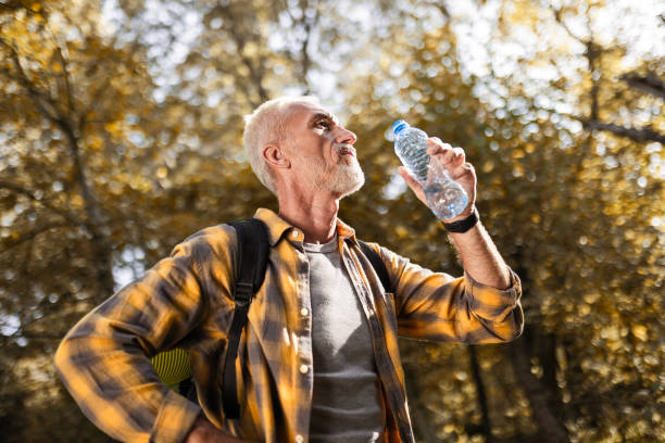 istock Senior Man Takes a Pause During Hike 2169474268