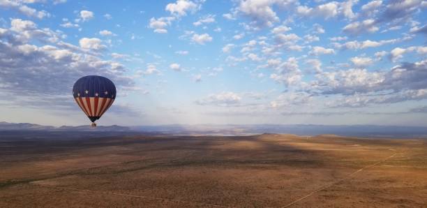 istock Hot air balloon horizon view 2169474705