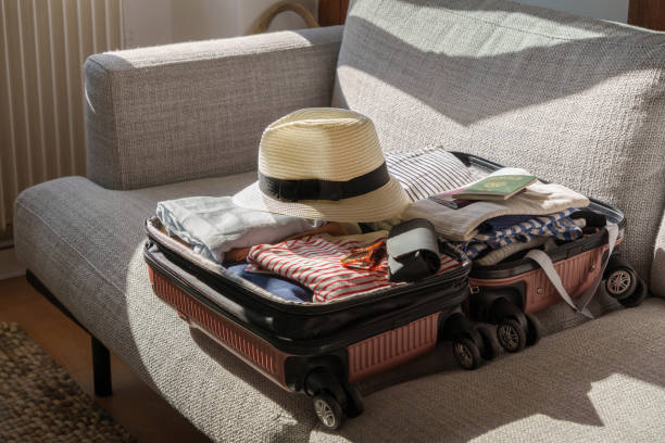istock Girl packing suitcase 2169476586