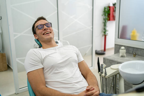 istock Smiling patient at the dental office 2169477275