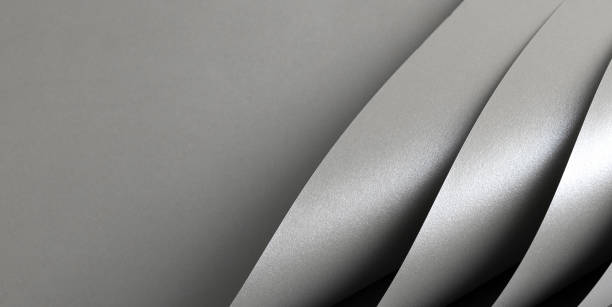 istock Gray shiny color paper background, smooth glowing shining silver aluminum texture, bent sheets 2169478620