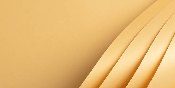 istock Yellow color paper background, smooth glowing shining texture, folded sheets 2169478648