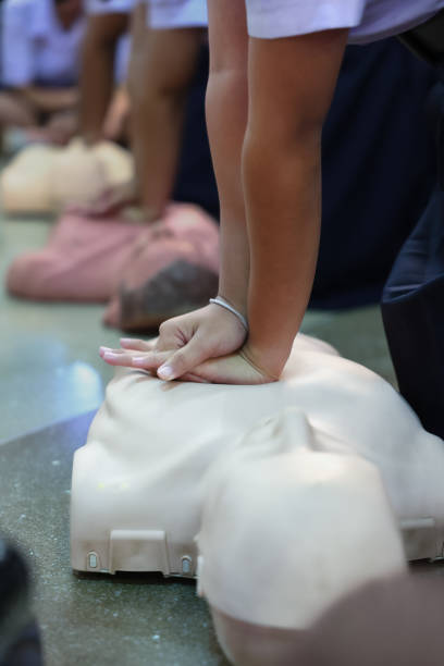 istock A person performs CPR chest compressions on a during a training session, highlighting essential life-saving techniques and emergency preparedness. 2169478764