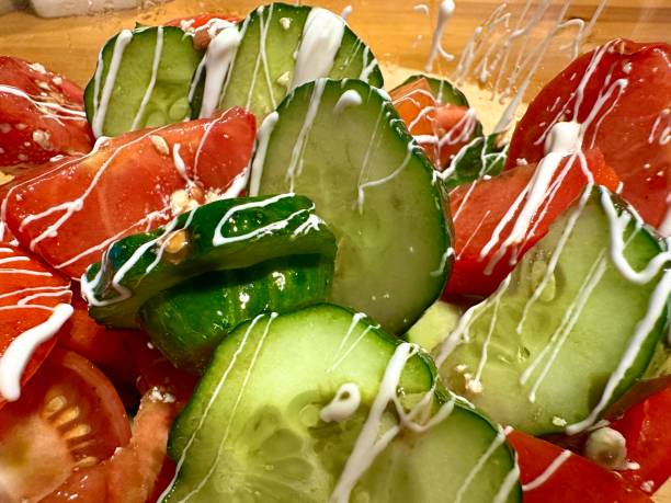 istock tomato and cucumber salad 2169478919