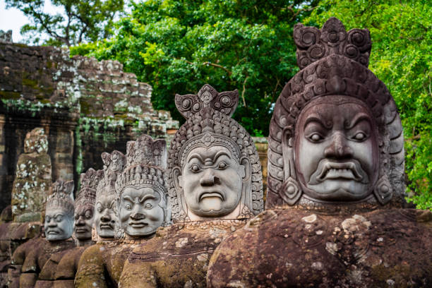 Exploring Ancient Ruins of Bayon Temple at Angkor, Siem Reap