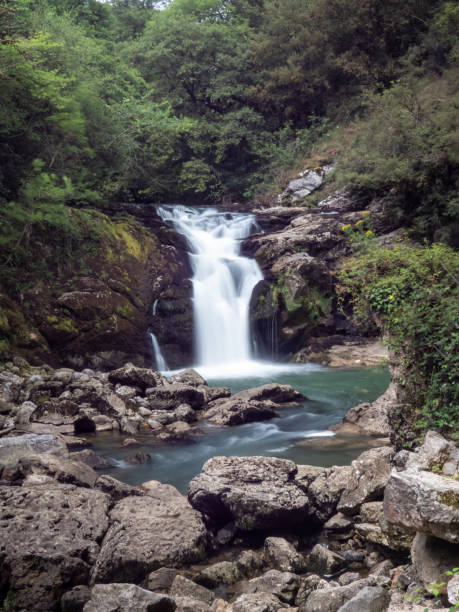istock Waterfall in the middle of nature 2169489723